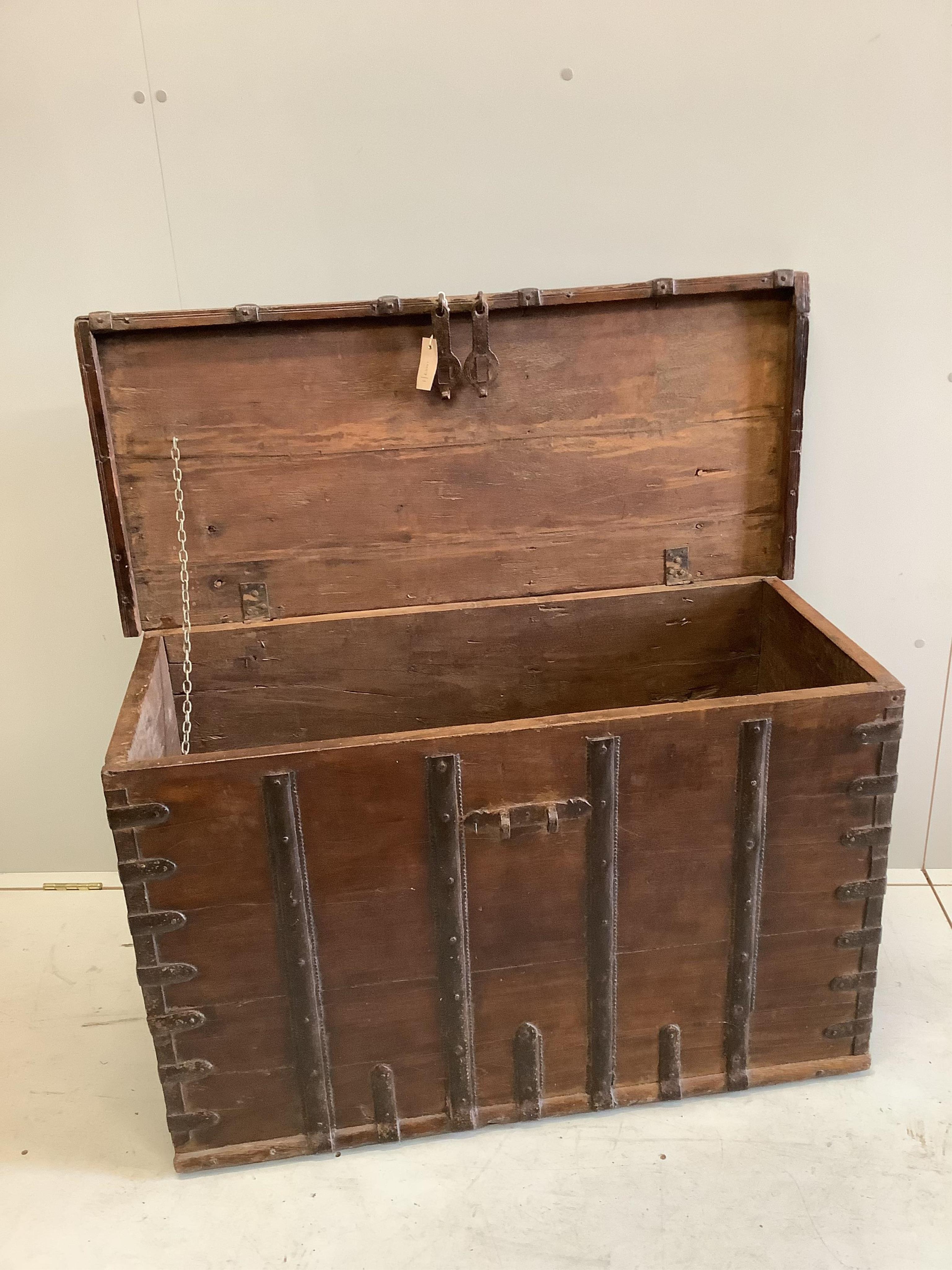 An iron bound hardwood trunk, width 102cm, height 65cm. Condition - fair to good